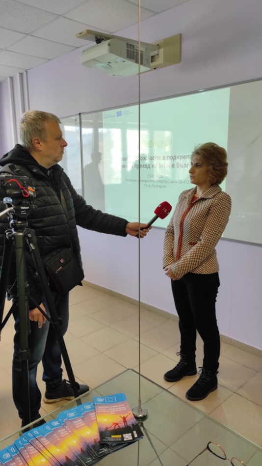 A woman being interviewed by media